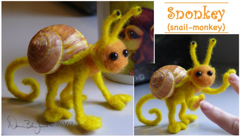 felted wool doll with snail shell